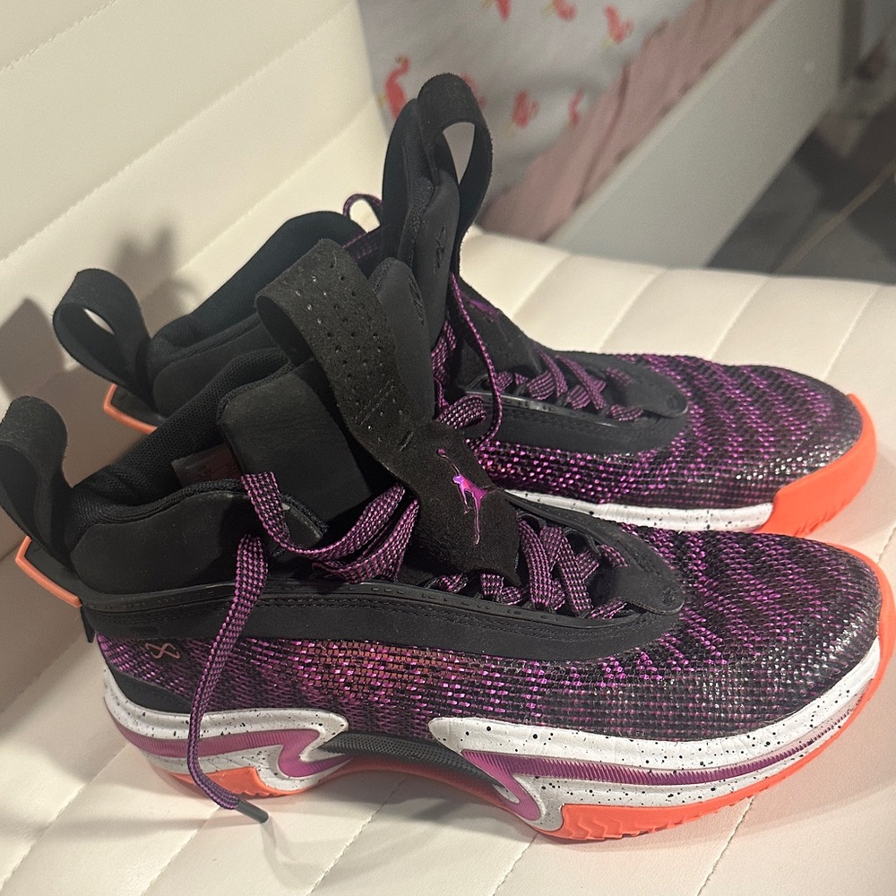 Jordan Black and Purple Sneakers with Orange Accents